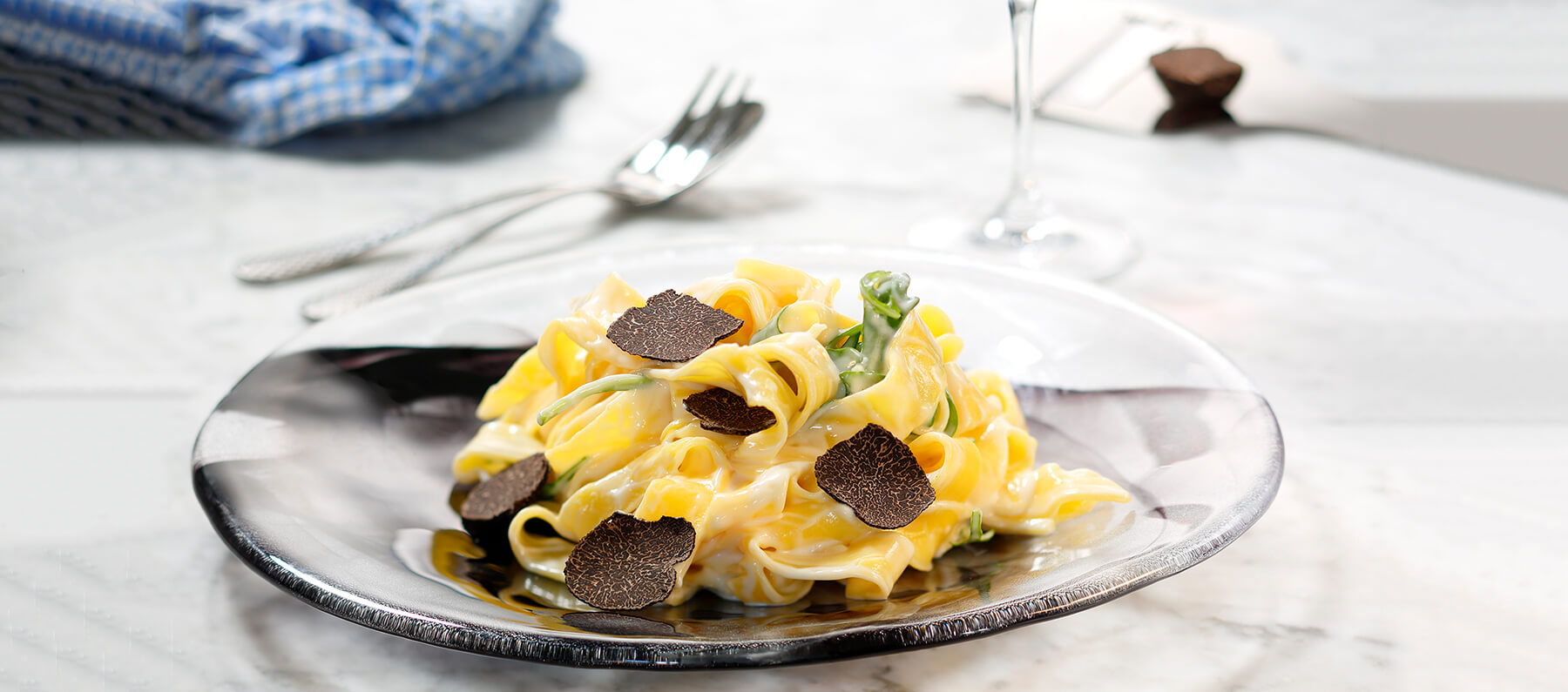 Recept på krämig tryffelpasta med ruccola och parmesan