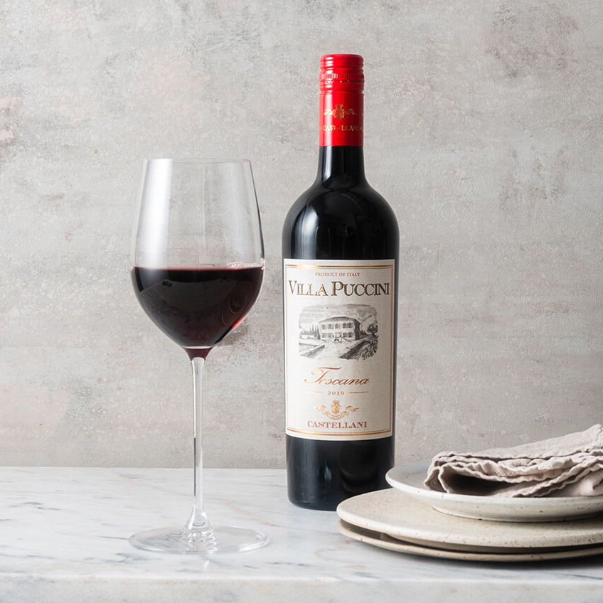 en flaska villa puccini och en tallrik